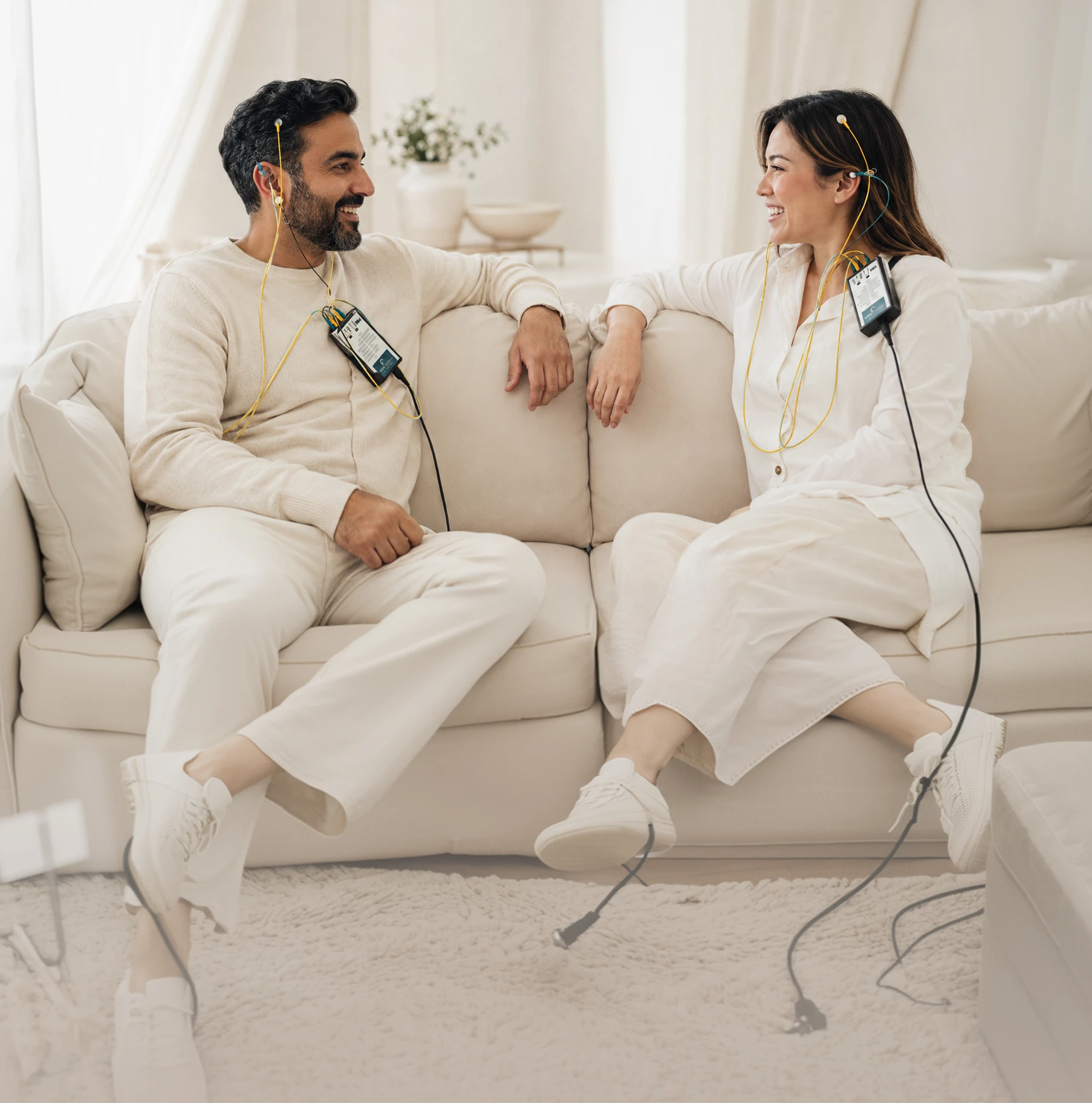 A guest in a relaxed neurofeedback session at Restore Body & Mind Studio